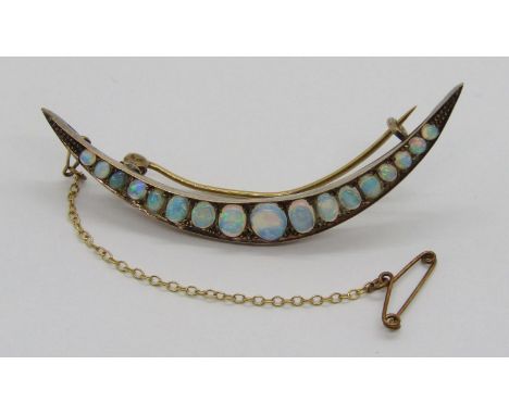 Antique yellow metal graduated opal crescent brooch, largest opal 6 x 5mm approx, brooch 6.1cm W approx, 5.7g