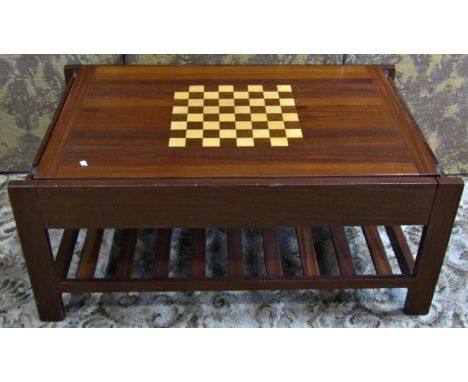 A good quality contemporary teak and inlaid games table with sliding compartmental top revealing a compartment interior with 