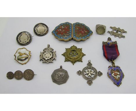 A Chinese cloisonné enamel buckle, together with a quantity of late 19th and early 20th century silver medallions and badges 