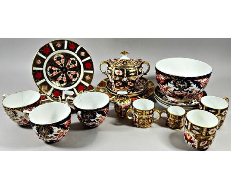 A Collection of Crown Derby Imari ware including graduated plates, sugar basin and cover, cups and saucers and further china