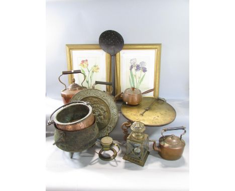 A quantity of old copper and brass items, including a cauldron, weighing scale, kettles, a skimmer, lantern, etc