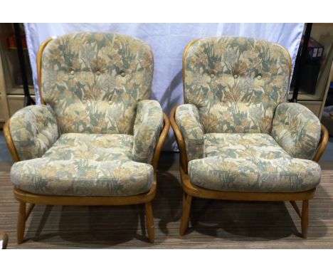 A pair of Ercol mid 20th century blonde elm Jubilee armchairs, surface wear throughout the frames but no visible damages or r