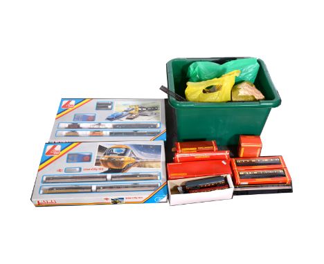 OO gauge model railways; a collection including examples by Lima, Hornby, with track, buildings, accessories, and two larger 