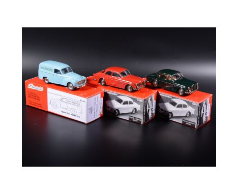 Somerville 1:43 scale white metal models; two no.136 Volvo Amazon 123 GT in red and green, and a no.140 Volvo 210 Panel Van i