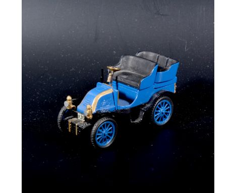 A unique scale mock-up model of the first car that Volvo produced, wood and cast metal construction, blue body with blue spok