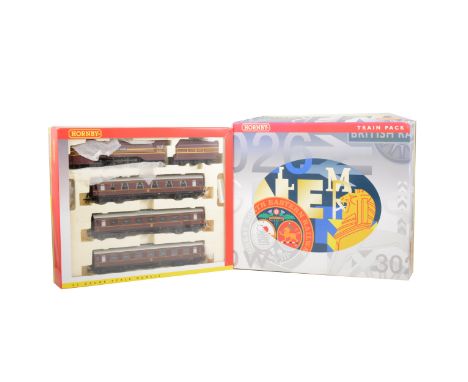 Hornby OO gauge model railway train pack set 3015; no.6227 "Duchess of Devonshire" LMS, with three passenger coaches, boxed. 