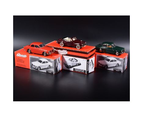 Somerville 1:43 scale white metal models; two no.136 Volvo Amazon 123 GT in red and green, and a no.138 Volvo 445 Cabriolet (