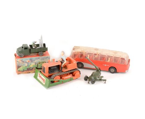 Mettoy electric coach, Tri-ang caterpillar tractor, Britains anti-aircraft gun, and a Lone-Star Rader lorry, boxed. (Qty: 4)