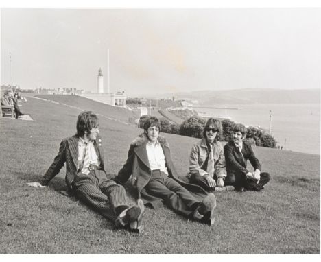 The Beatles interest; Five large black and white photo stills from 'The Magic Mystery Tour' 25cm by 35cm. (Qty: 5)