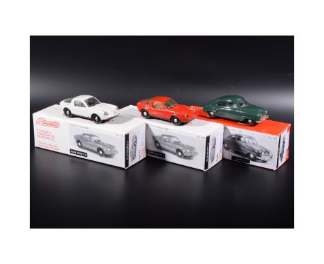 Somerville 1:43 scale white metal models; two no.125 Saab Sonett II in red and white, and a no.199 Saab 92 in green, boxed. (