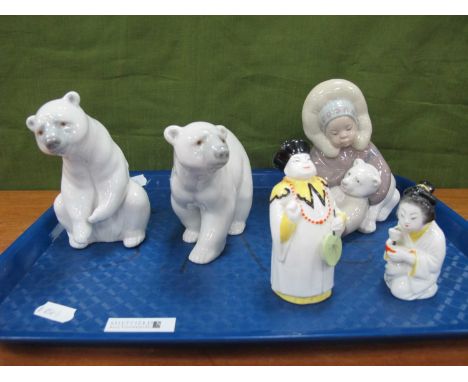 Lladro Eskimo Girl with Polar Bear, and two Lladro polar bears, Royal Worcester Nandarin and Japanese Girl candle snuffers. (