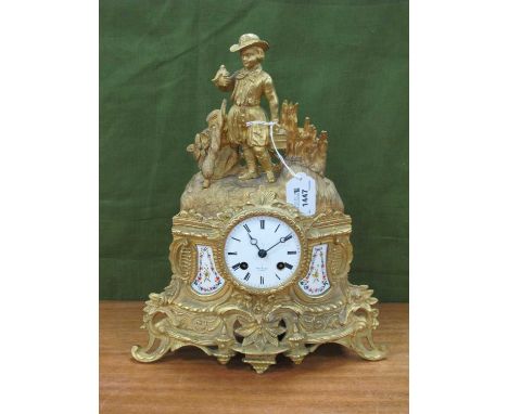 French Gilt Metal Cased Mantle Clock, with bird fancier atop, eight-day movement Hry Marc a Paris, 34.5cm high.this is spelte