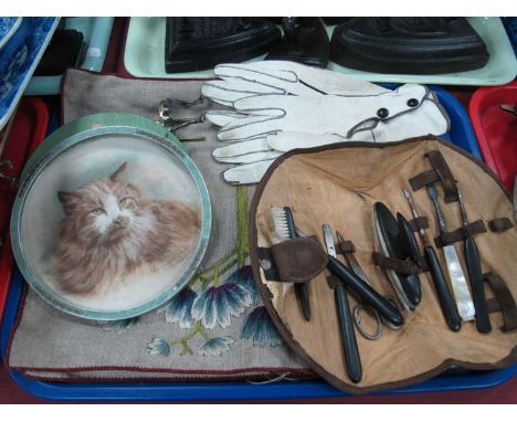 Debenham &amp; Gould Bournemouth Early XX Century Cat, circular glazed frame, easel back; a vintage manicure case with assort
