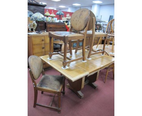 1920's Oak Drawleaf Table, together with four oak dining chars, with leather backs, drop in seats, on turned and block suppor