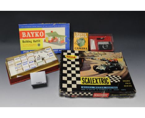 A BOXED SCALEXTRIC G.P.01 MOTOR RACING SET, a boxed Bayko No.12 building set, a boxed Timex gents wristwatch, boxed Kodak Ins