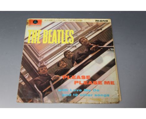 A BEATLES PLEASE PLEASE ME 33 1/3 RPM LP, with signatures to the back of the sleeve. Believed to be signed at Birmingham Town