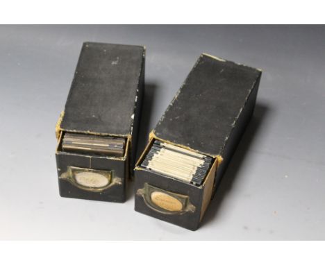 TWO BOXES OF GLASS MAGIC LANTERN SLIDES, one of 'Cornish Crosses', the other comprising miscellaneous subjects to include top