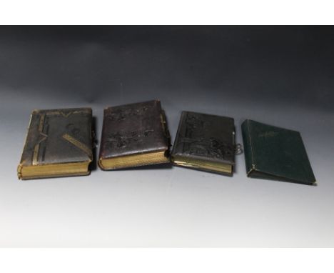 FOUR VINTAGE PHOTOGRAPH ALBUMS, two containing Victorian portrait cabinet type photographs