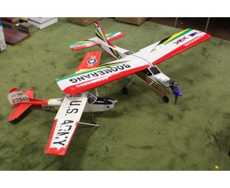 A LARGE SCALE RADIO CONTROL BOOMERANG MONOPLANE WITH S. C. 4-STROKE MOTOR and a U.S. Army radio control monoplane