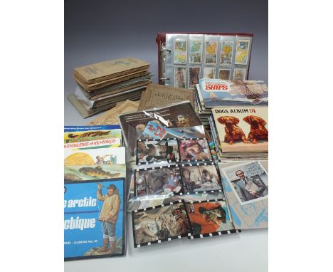 A COLLECTION OF VINTAGE CIGARETTE AND TEA CARDS, contained in various albums, the cigarette card collections by John Player &