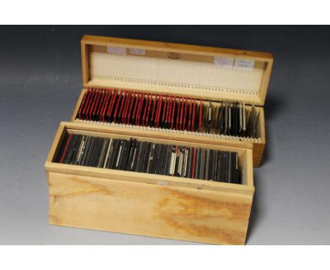 TWO BOXES OF GLASS MAGIC LANTERN SLIDES, various subjects to include ships, topographic, and religious types etc