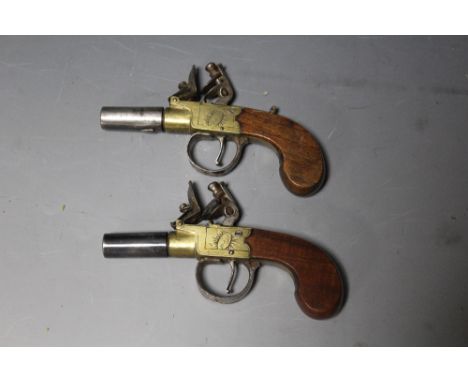 A SMALL PAIR OF GEORGIAN FLINTLOCK POCKET PISTOLS, signed 'Bass, London' to the brass locks, with threaded steel barrels, L 1