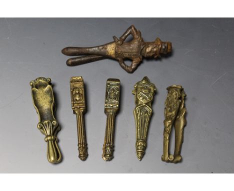 A COLLECTION OF NOVELTY AND VINTAGE BRASS AND CAST NUT CRACKERS, to include a brass Fagin & Bill Sykes nut cracker, and a sol