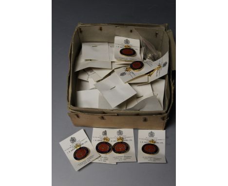 A BOX OF J. R. GAUNT GRENADIER GUARDS ASSOCIATION ENAMEL BADGES
