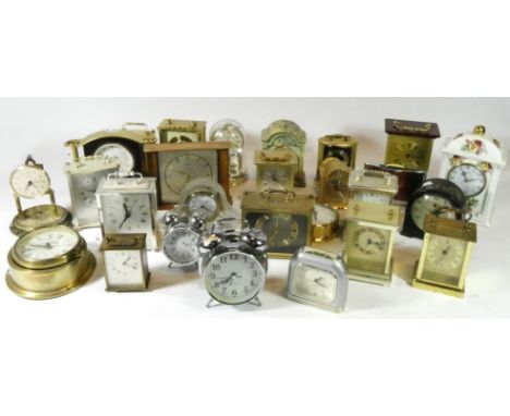 Three boxes of mid 20th century and later mantel clocks, having manual wind and quartz movements. (3) 