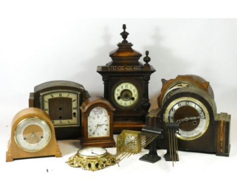A collection of early 20th century and later mantel clock, having manual and quartz movements. (4) 