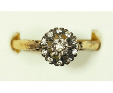 An 18ct gold and diamond cluster ring, R, 3.9gm 