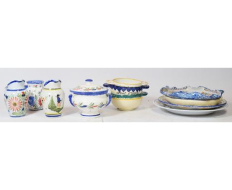 A collection of French studio pottery, Quimper, to include plates, jugs, handled bowls and others