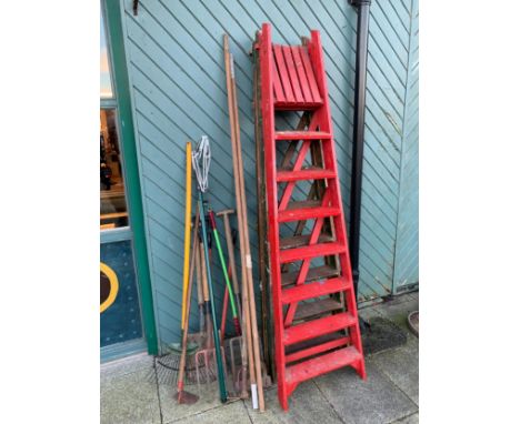 Two sets of painted wooden ladder, c.1950s, together with garden tools such as forks, a spade and others