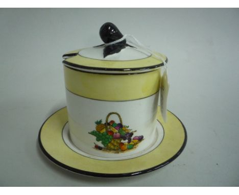 A CARLTONWARE PRESERVE POT/COVER AND STAND, decorated with fruit, label to base and painted, No. 2539