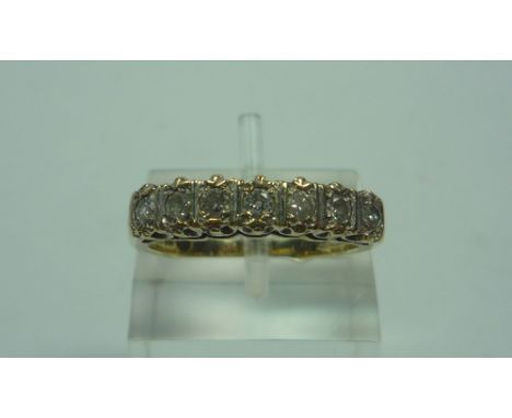 A 9CT GOLD .25CT SEVEN DIAMOND HALF ETERNITY RING, size L 1/2, boxed