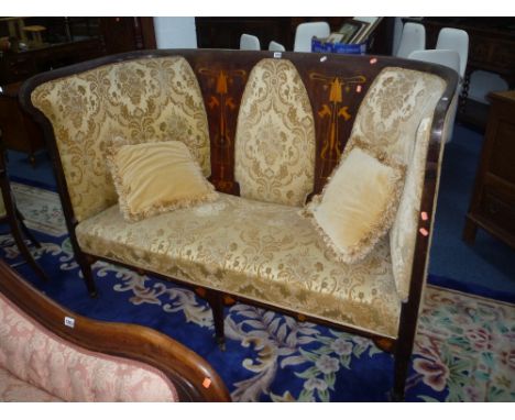 A 19TH CENTURY ART NOUVEAU STYLE MAHOGANY INLAID BENCH, the high raised back extending around both sides with gold upholstery