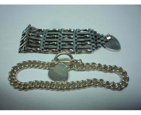 A SILVER GATE BRACELET, with a silver curb link bracelet (2)