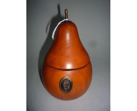 A TREEN PEAR, with hinged lid to inner well, lock and finial metal mounts