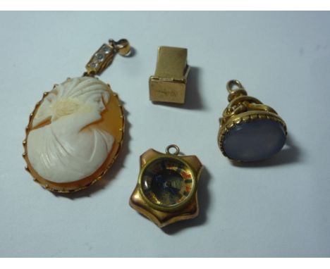 A VICTORIAN GOLD CAMEO PENDANT, a gold seal, a gold compass and a 9ct gold dice holder (4)