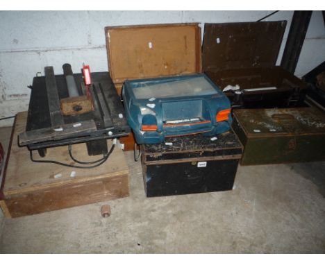 A DEED BOX, two metal ammunition crates and a wooden crate containing various tools and a table saw