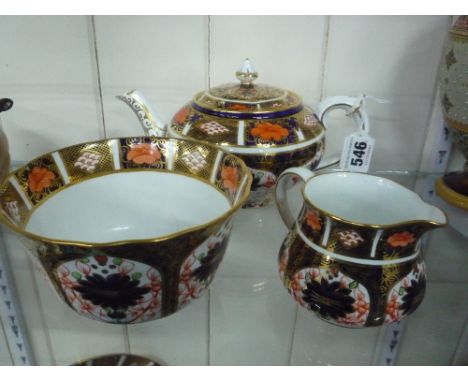 A ROYAL CROWN DERBY IMARI TEA SERVICE, '1128' pattern, to include teapot, milk jug and sugar bowl (3)