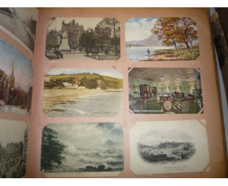 AN EARLY 20TH CENTURY POSTCARD ALBUM, contents loosely inserted, topographical, greetings, portrait,