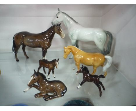 FIVE BESWICK HORSES, to include foals No 915, No.997 and No.1817, and Huntsman's horse No 1484 and Pony No 1480 (sd), togethe