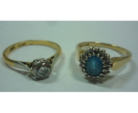 AN 18CT GOLD PLATINUM SET SOLITAIRE, approximately .40, size N, together with a 9ct gold blue topaz ring, size K 1/2 (2)