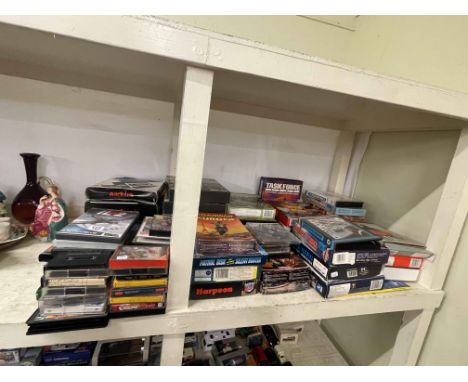 Collection of vintage cassette tapes, video games, etc.