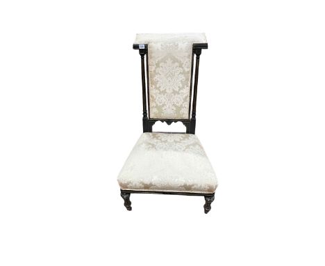 Victorian ebonised and gilt painted Prie Dieu in light classical fabric.