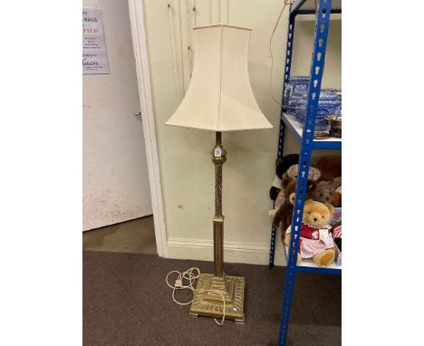 Brass part twist column standard lamp and shade, and three gilt metal table lamps including one four branch (4).