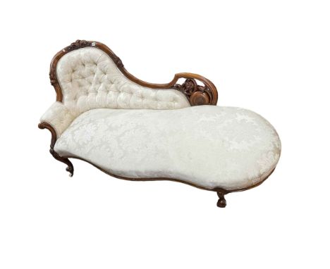 Victorian mahogany framed chaise longue in light buttoned classical fabric.