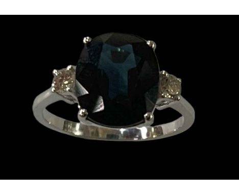 Sapphire and diamond three stone 18 carat gold ring, with large cushion sapphire over 4.5 carat, size N.