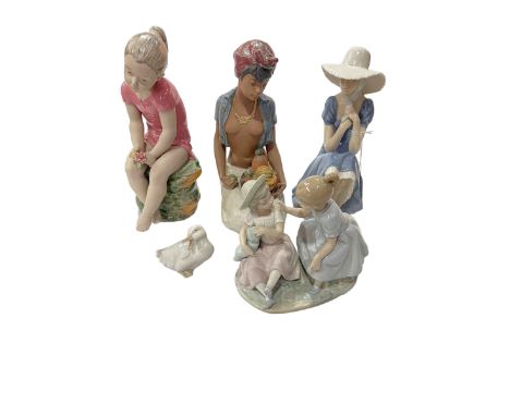 Five Nao pieces including large fruit seller and girl with posy, tallest 29cm.